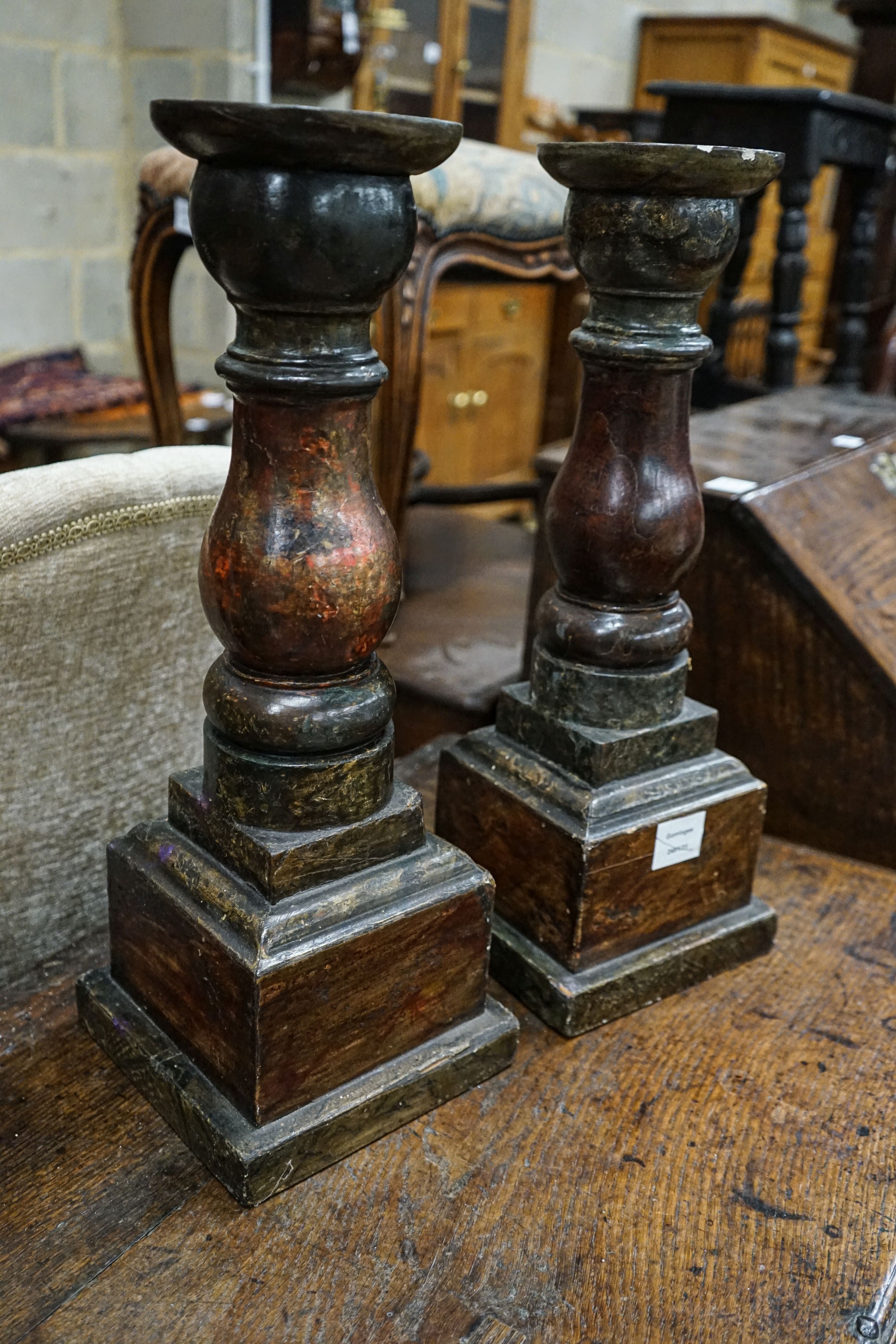 A pair of turned and painted wood lamp bases, height 51cm